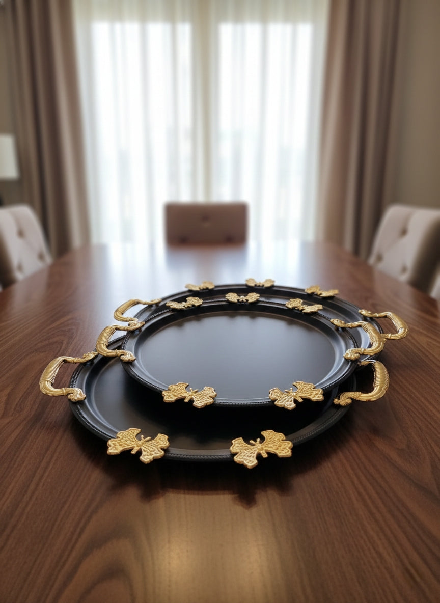 Set of 3 high-quality stainless steel serving trays with gold handles for home decor and serving food.