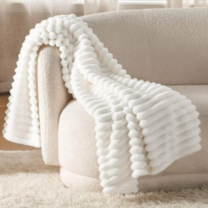Thick ribbed fleece blanket with soft velour texture in 6 by 6 size.