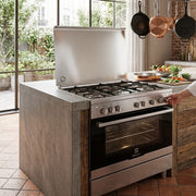 Electrolux 90x60cm free standing gas cooker with 5 burners and 102L oven in stainless steel finish for modern kitchen cooking.