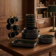 32 piece dinner set including plates, bowls, cups, saucers, and platters for complete dining use.