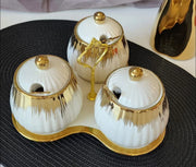 3 ceramic sugar canisters with triangle stand in white and black design