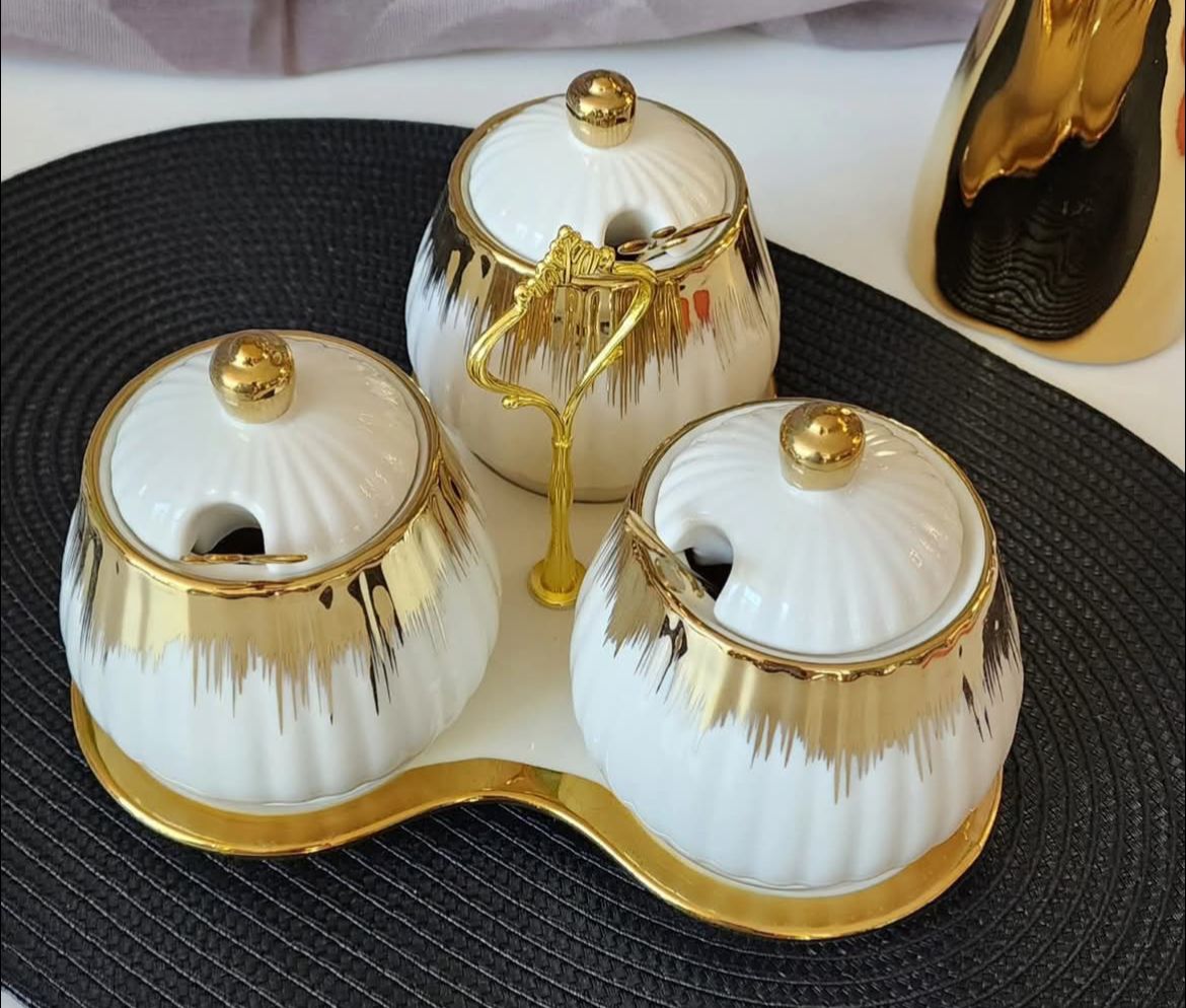 3 ceramic sugar canisters with triangle stand in white and black design