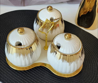 3 ceramic sugar canisters with triangle stand in white and black design