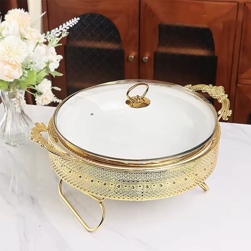 Ceramic buffet food warmer with stainless steel stand and bottom stove.