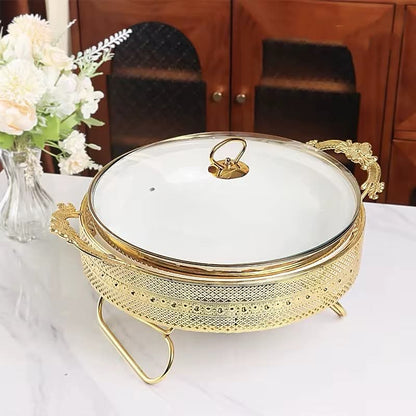 Ceramic buffet food warmer with stainless steel stand and bottom stove.
