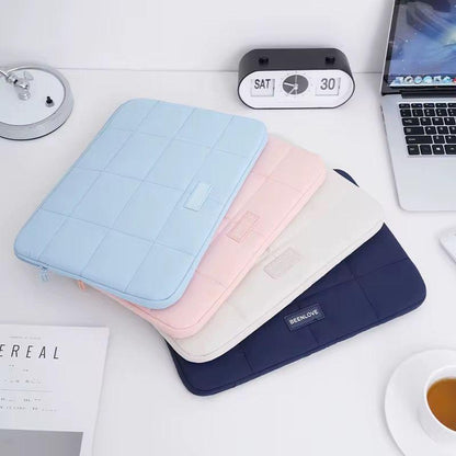 15.6 inch shock proof quilted laptop sleeve bag in pink, cream white beige, and navy blue.