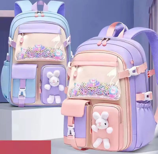 Lightweight girls school backpack in purple, blue, and pink.