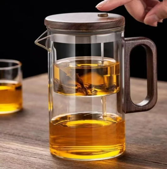One press glass infuser teapot, clear tea maker with built-in infuser for easy brewing.