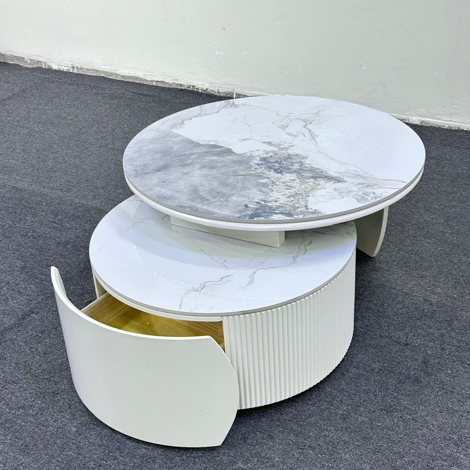 Dawood Lifestyle & Gadgets kes 2-piece rotating nesting coffee table set with marble top, fluted MDF base, curved storage drawer, and 360-degree rotating design for modern living room décor.
