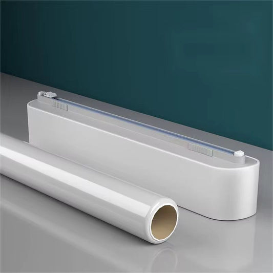 Plastic wrap cutter and cling film dispenser with built-in cutter and cling film roll.