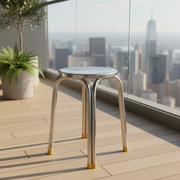 Minimalist stainless steel stool with round seat and sturdy legs designed for kitchen, utility, and household seating use.