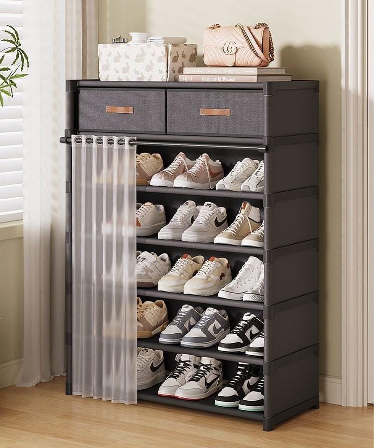 Multi-layer shoe cabinet with drawers, metal frame, and fabric racks in black and white.