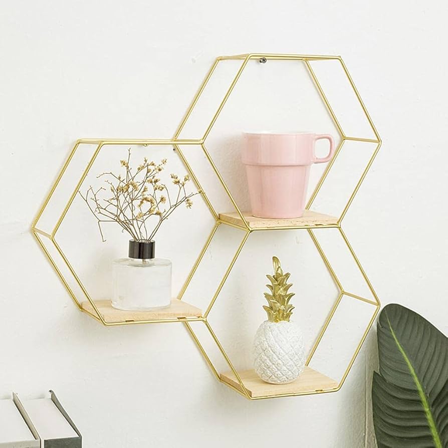 Dawood Lifestyle & Gadgets kes 3-piece gold hexagon wall shelf set with natural wood bases in a honeycomb floating design for modern home décor.