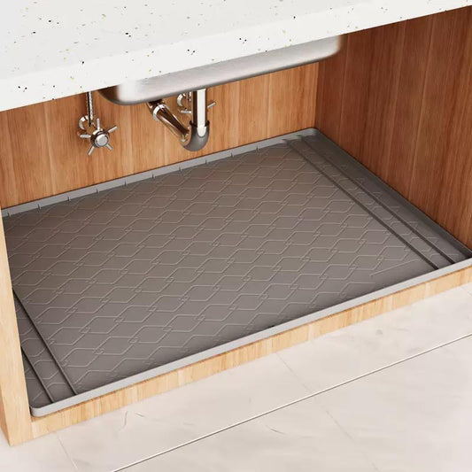 Silicone waterproof under sink shelf mat 86.4x58.5cm, cut to fit cabinet liner for leak protection. 