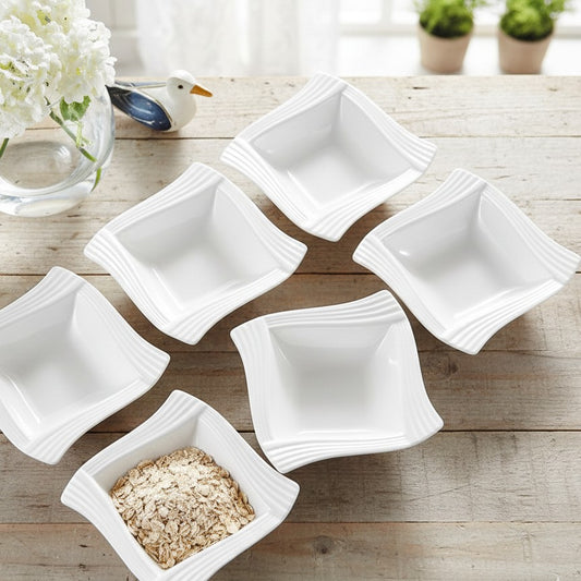 Set of 6 white 7.5 inch ceramic soup plates.