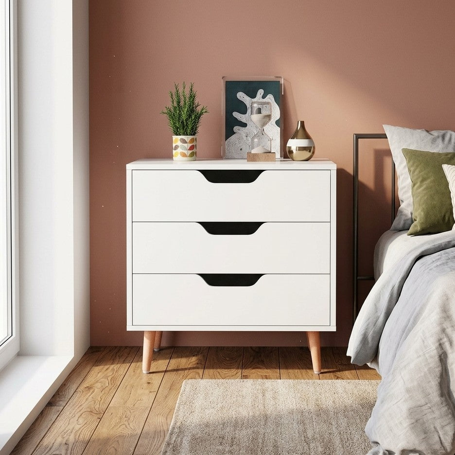 White wooden bedside chest with 3 drawers for bedroom and home storage organization. 