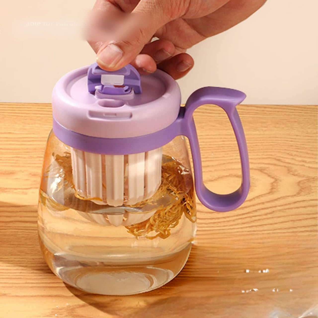 Water bottle with built in fruit infuser for flavored hydration.