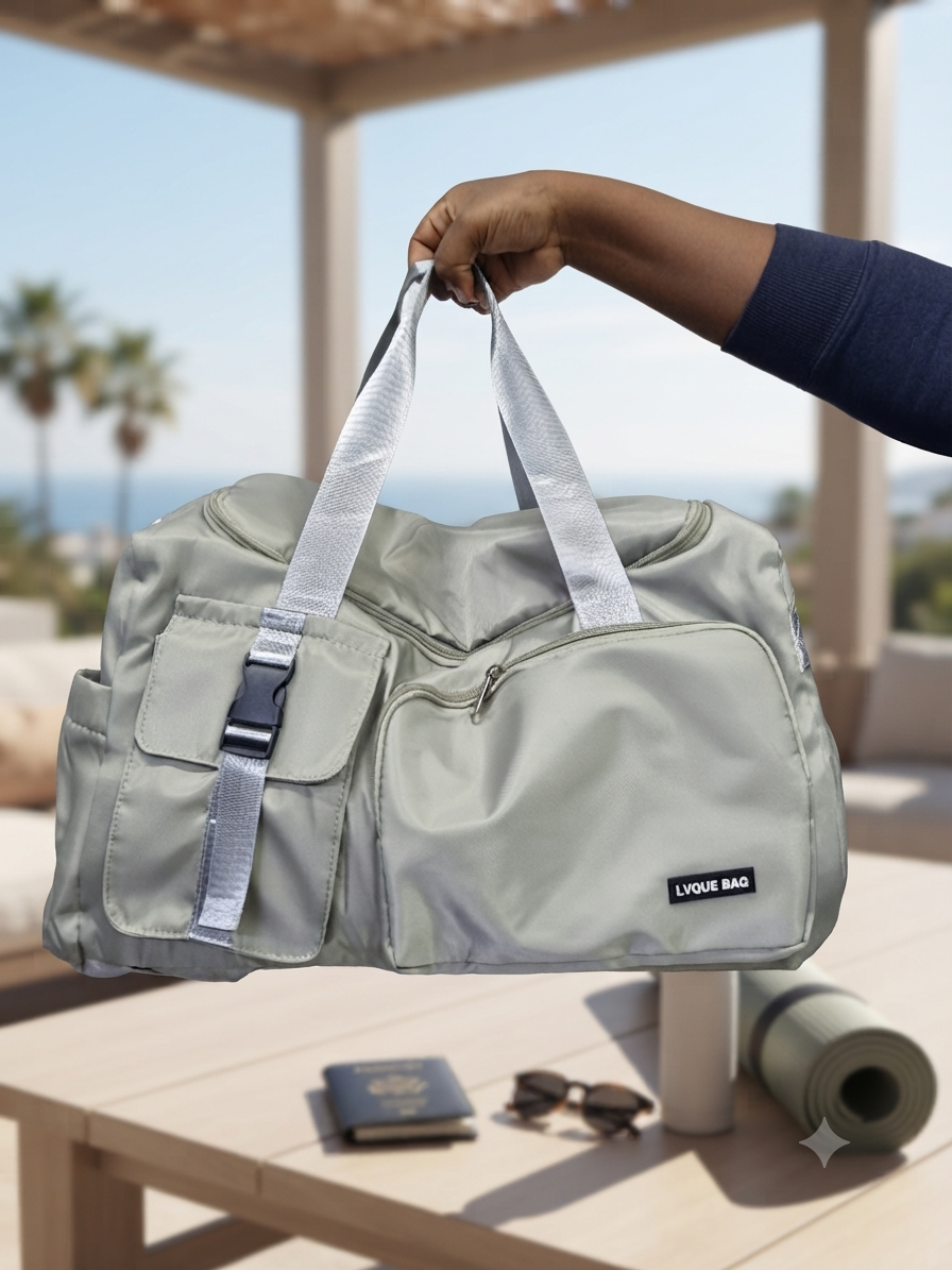 Green waterproof gym and travel bag with spacious interior for carrying essentials.