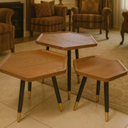 piece hexagonal nesting table stools with MDF tops and black metal legs with gold feet