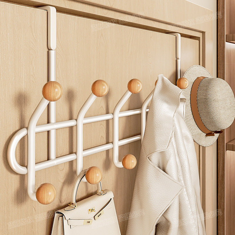 Heavy duty metal over-the-door rack for coats, hats, robes, and towels.