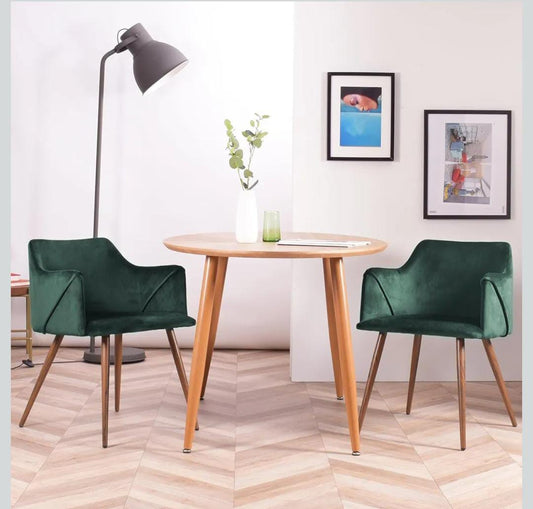 Green velvet chair with armrests and thick sponge seat suitable for dining or office use