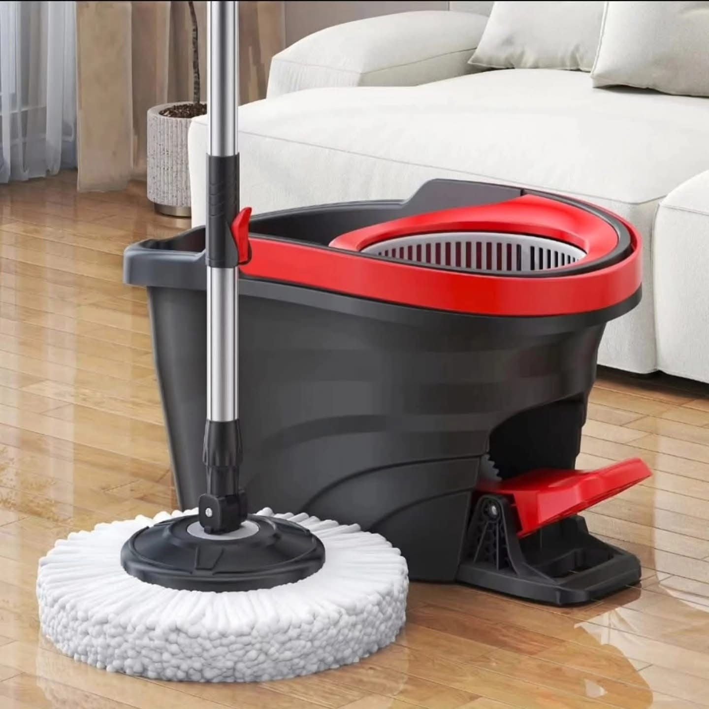 Black spin mop bucket with foot pedal for hands-free wringing and efficient floor cleaning