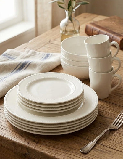 24-piece ceramic dotted dinnerware set including dinner plates, side plates, bowls, and cups for modern dining.
