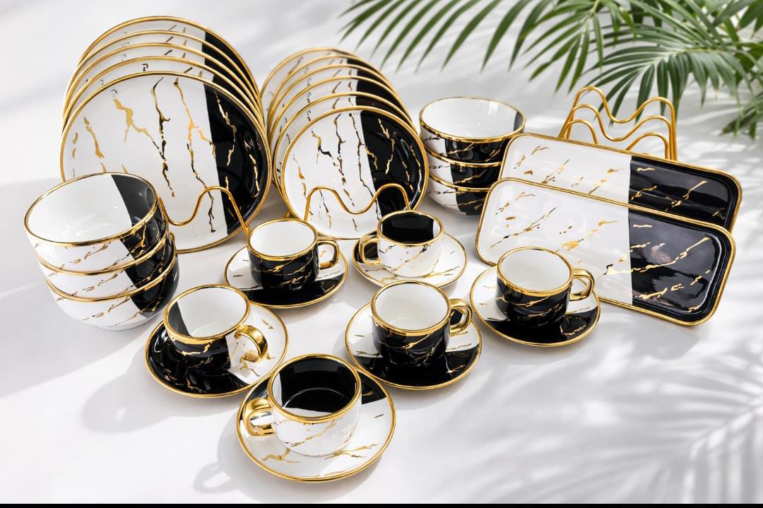 32 piece Marble green dinner set with plates, bowls, mugs, saucers, and platters