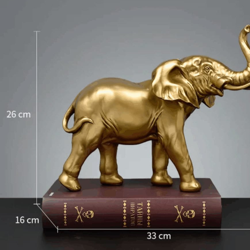 Dawood Lifestyle & Gadgets kes mirror gold elephant figurine with raised trunk, detailed body and tusks, measuring 33cm long and 26cm high for luxury home and office décor