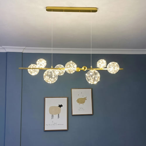 Set of five modern pendant lights with glowing elegant designs for interior décor
