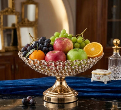 Gold pedestal centerpiece bowl with crystal accents and open decorative design