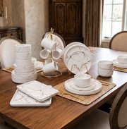 32 Piece matte marble finish stoneware dinner set with plates, bowls, mugs, cups, and platters