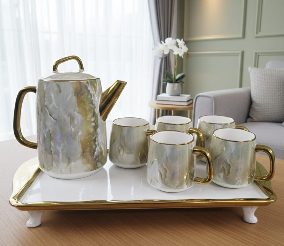 7-piece Nordic marble ceramic tea set with tray, kettle, and five cups.