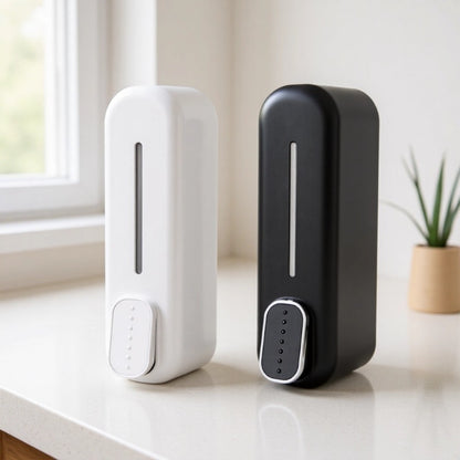 Wall-mounted manual press soap dispenser in black and white for bathroom use