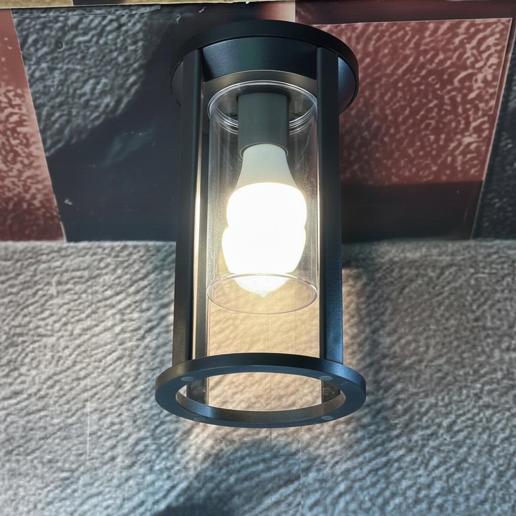 Black cylindrical outdoor wall light with E27 holder for entrance, garden, pathway, and patio lighting LL 5009-BK - Gemelli Collection