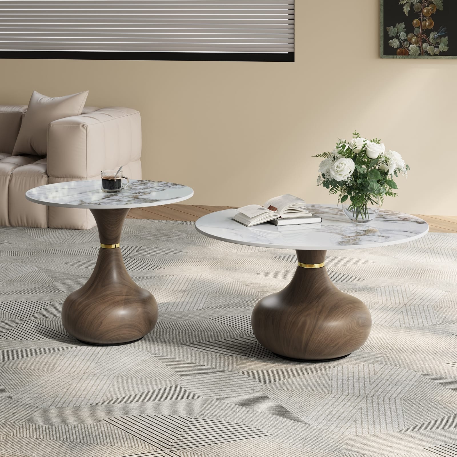 Marble-top nesting coffee tables with gold or chrome metal base.