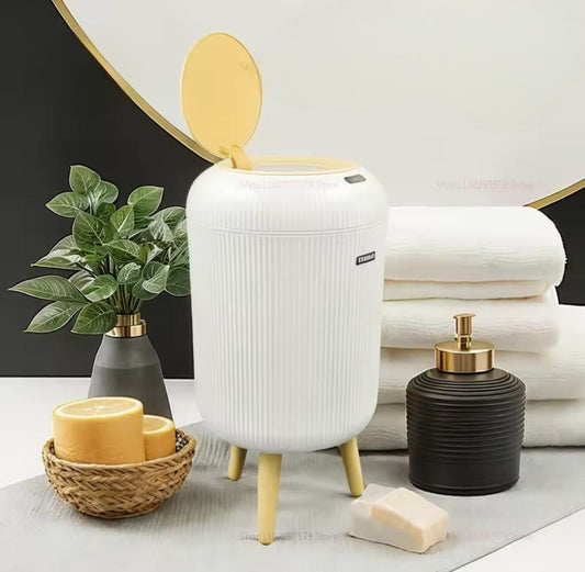 White smart motion sensor trash can with automatic flip lid.