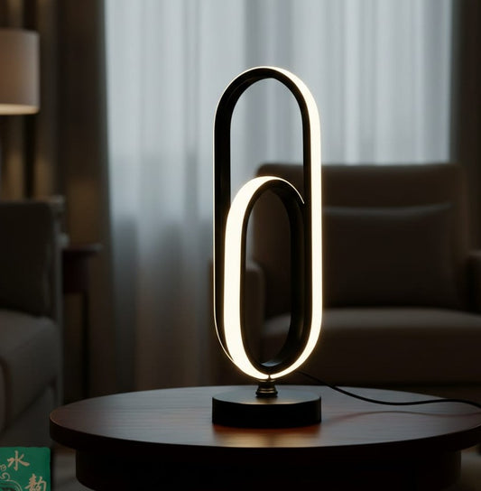 U-shaped modern LED table lamp with double-loop black design
