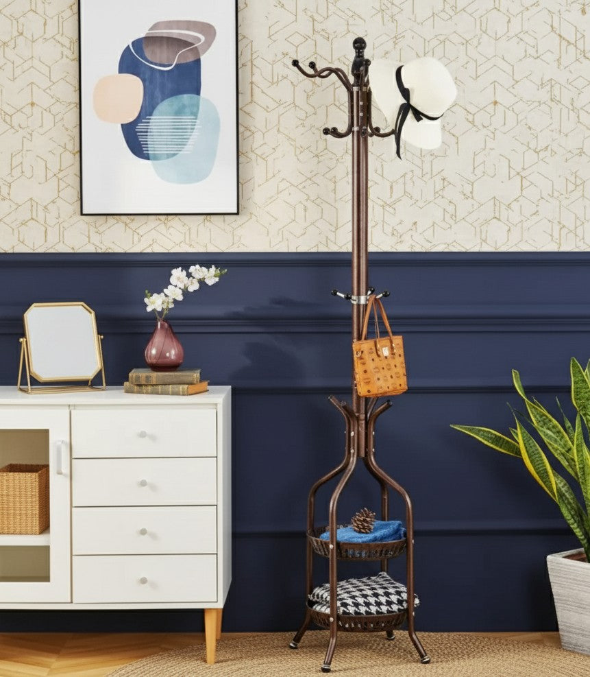 Heavy duty wrought iron floor-standing coat and handbag rack with hooks and lower shelf.