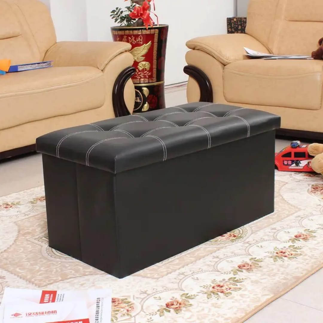 Black ottoman storage box with leather finish and large capacity for home organization