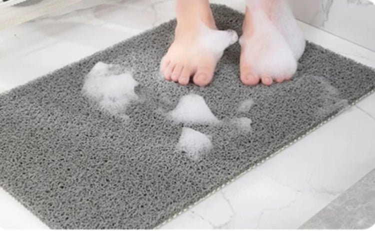 Loofah bath mat 50x80cm with drainage design for bathroom use.