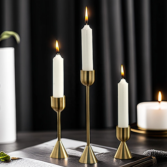 Set of three aluminium candle holders in different heights, elegant tiered display for home décor or events.