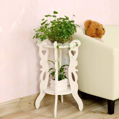 Large 3-legged 2-layer white decor table, 57cm by 35cm.