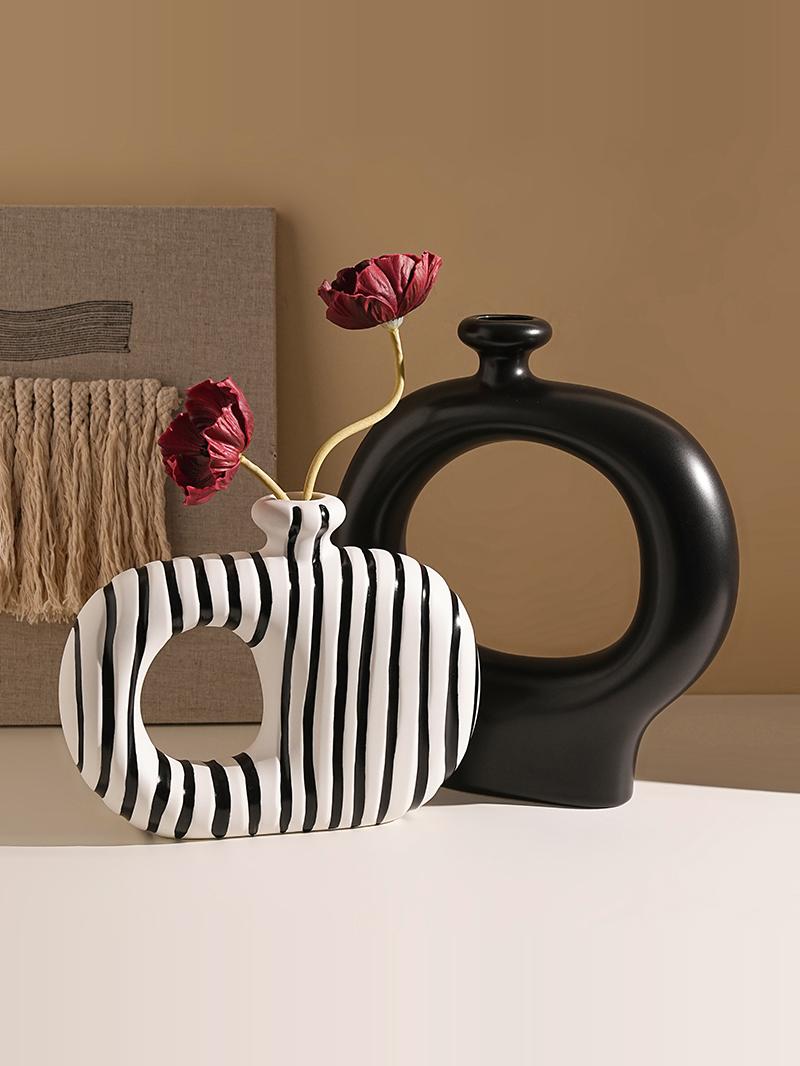 Midnight Loop ceramic vase with sculptural modern design for elegant home and office décor. 🖤✨