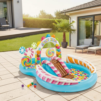 Candy-themed inflatable play pool with water slide and ball zone