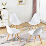 Wooden Table With Metallic Base And Padded Eames Chair