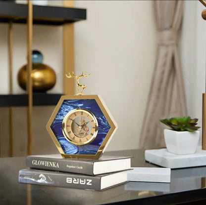 Elk-themed gold and blue desktop clock designed as a decorative and functional timepiece for home or office. 