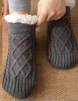 Fluffy velvet indoor socks slippers with non slip sole.