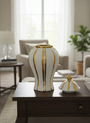 White ceramic gold plated ginger vase with stripe design.