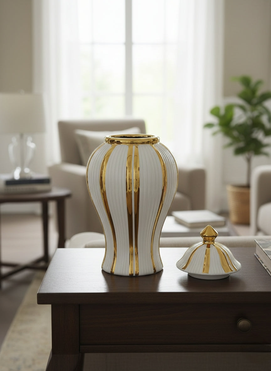 White ceramic gold plated ginger vase with stripe design.